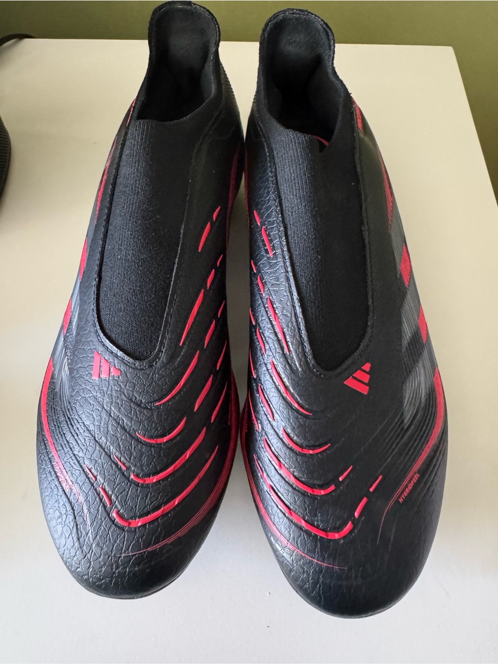 adidas Black Athletic Slip-On Shoes with Red Accents